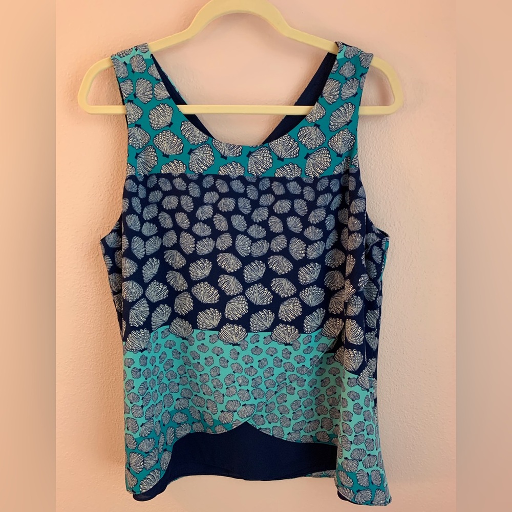 Layered surplice sleeveless top